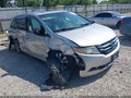 2014 Honda Odyssey — photo 1 of 16 | VIN 5FNRL5H67EB075212
