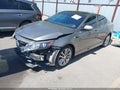 2015 Kia Optima — photo 2 of 17 | VIN 5XXGR4A64FG353685