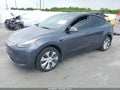 2023 Tesla Model Y — photo 2 of 14 | VIN 7SAYGDEE1PA203694