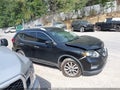 2017 Nissan Rogue — photo 13 of 16 | VIN 5N1AT2MT1HC808715