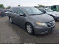 2015 Honda Odyssey — photo 1 of 16 | VIN 5FNRL5H67FB034905