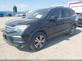 2016 Honda Pilot — photo 2 of 16 | VIN 5FNYF6H51GB012755