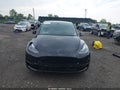 2022 Tesla Model Y — photo 11 of 15 | VIN 7SAYGDEF0NF511240