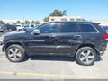 2014 Jeep Grand Cherokee — photo 6 of 17 | VIN 1C4RJFCM7EC393412