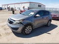 2014 Kia Sportage — photo 2 of 16 | VIN KNDPBCAC4E7597915