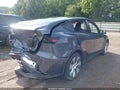 2023 Tesla Model Y — photo 4 of 14 | VIN 7SAYGDEE7PF912973