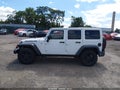 2016 Jeep Wrangler Unlimited — photo 14 of 16 | VIN 1C4BJWDG0GL136430