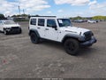 2016 Jeep Wrangler Unlimited — photo 1 of 16 | VIN 1C4BJWDG0GL136430