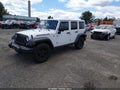 2016 Jeep Wrangler Unlimited — photo 2 of 16 | VIN 1C4BJWDG0GL136430