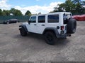 2016 Jeep Wrangler Unlimited — photo 3 of 16 | VIN 1C4BJWDG0GL136430