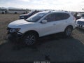 2015 Nissan Rogue — photo 2 of 22 | VIN 5N1AT2MV7FC827509