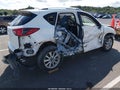 2014 Mazda CX-5 — photo 4 of 16 | VIN JM3KE4CYXE0315390