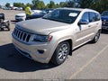 2014 Jeep Grand Cherokee — photo 2 of 22 | VIN 1C4RJFCMXEC393520