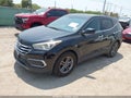 2018 Hyundai Santa Fe — photo 2 of 16 | VIN 5NMZT3LB3JH091828