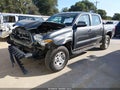 2016 Toyota Tacoma — photo 2 of 19 | VIN 5TFAX5GN8GX064254