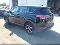 2018 Toyota RAV4 — photo 3 of 16 | VIN 2T3RFREV0JW794476