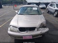 2002 Mazda 626 — photo 12 of 16 | VIN 1YVGF22C725278961