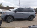 2024 Honda Passport — photo 14 of 16 | VIN 5FNYF8H62RB020094
