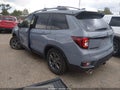 2024 Honda Passport — photo 3 of 16 | VIN 5FNYF8H62RB020094