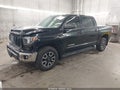 2016 Toyota Tundra — photo 2 of 17 | VIN 5TFDW5F14GX506008