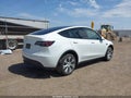 2023 Tesla Model Y — photo 4 of 19 | VIN 7SAYGAEE8PF675263