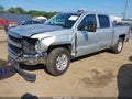 2018 Chevrolet Silverado 1500 — photo 2 of 17 | VIN 3GCUKREC6JG330192