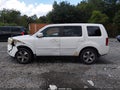 2014 Honda Pilot — photo 15 of 17 | VIN 5FNYF4H58EB031997