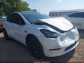 2023 Tesla Model Y — photo 6 of 15 | VIN 7SAYGDEF0PF605234