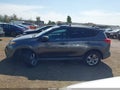 2015 Toyota RAV4 — photo 14 of 16 | VIN 2T3WFREV0FW176424