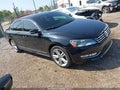 2014 Volkswagen Passat — photo 1 of 16 | VIN 1VWCN7A32EC074300