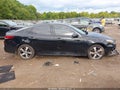 2019 Kia Optima — photo 13 of 16 | VIN 5XXGT4L32KG352419