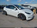 2022 Tesla Model Y — photo 1 of 20 | VIN 7SAYGDEF9NF540607