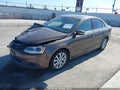 2014 Volkswagen Jetta — photo 2 of 19 | VIN 3VWD17AJ2EM411917