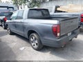 2025 Honda Ridgeline — photo 3 of 18 | VIN 5FPYK3F51SB022795