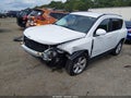 2014 Jeep Compass — photo 2 of 11 | VIN 1C4NJDEB1ED734747