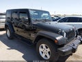 2016 Jeep Wrangler Unlimited — photo 6 of 16 | VIN 1C4BJWDG7GL191523