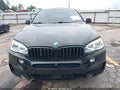 2018 BMW X6 — photo 12 of 16 | VIN 5UXKU6C58J0Z66538