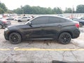 2018 BMW X6 — photo 14 of 16 | VIN 5UXKU6C58J0Z66538