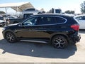 2019 BMW X1 — photo 14 of 16 | VIN WBXHU7C5XK5L11077