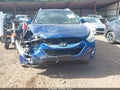 2014 Hyundai Tucson — photo 12 of 16 | VIN KM8JU3AGXEU901636