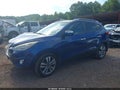 2014 Hyundai Tucson — photo 14 of 16 | VIN KM8JU3AGXEU901636