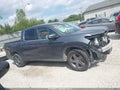 2023 Honda Ridgeline — photo 14 of 17 | VIN 5FPYK3F55PB028056