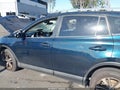 2018 Toyota RAV4 — photo 14 of 16 | VIN JTMRFREV7JJ722995