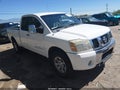 2005 Nissan Titan — photo 1 of 17 | VIN 1N6AA06B55N559044