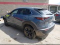 2023 Mazda CX-30 — photo 3 of 16 | VIN 3MVDMBCM8PM573508