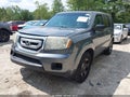 2011 Honda Pilot — photo 2 of 13 | VIN 5FNYF4H28BB085799