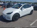 2022 Tesla Model Y — photo 2 of 11 | VIN 7SAYGDEF5NF445011