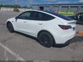 2022 Tesla Model Y — photo 3 of 11 | VIN 7SAYGDEF5NF445011