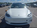 2022 Tesla Model Y — photo 6 of 11 | VIN 7SAYGDEF5NF445011