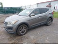 2013 Hyundai Santa Fe — photo 2 of 10 | VIN 5XYZT3LBXDG044360